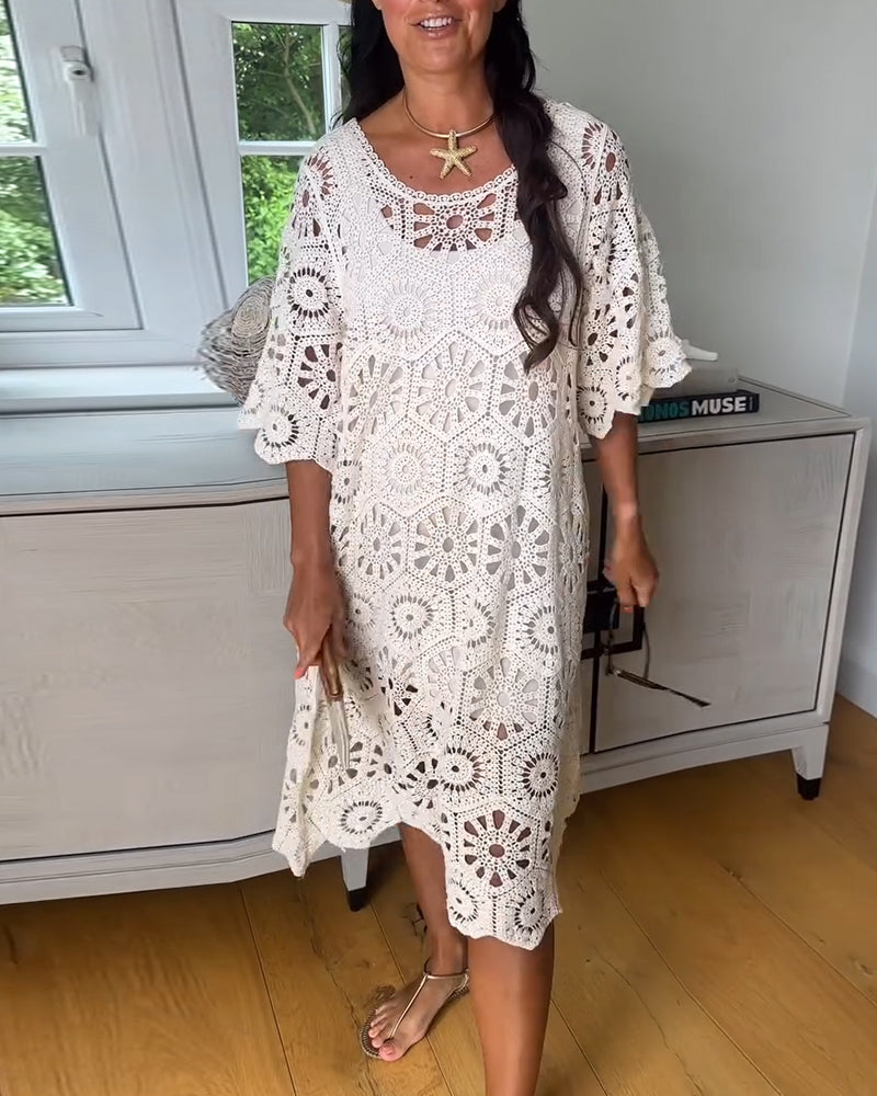 Cotton Dress Featuring a Cut-Out Design and Half Sleeves