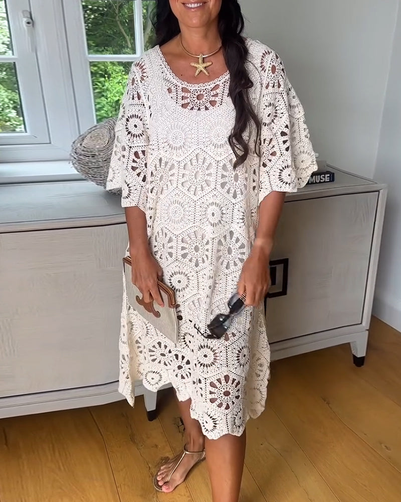 Cotton Dress Featuring a Cut-Out Design and Half Sleeves