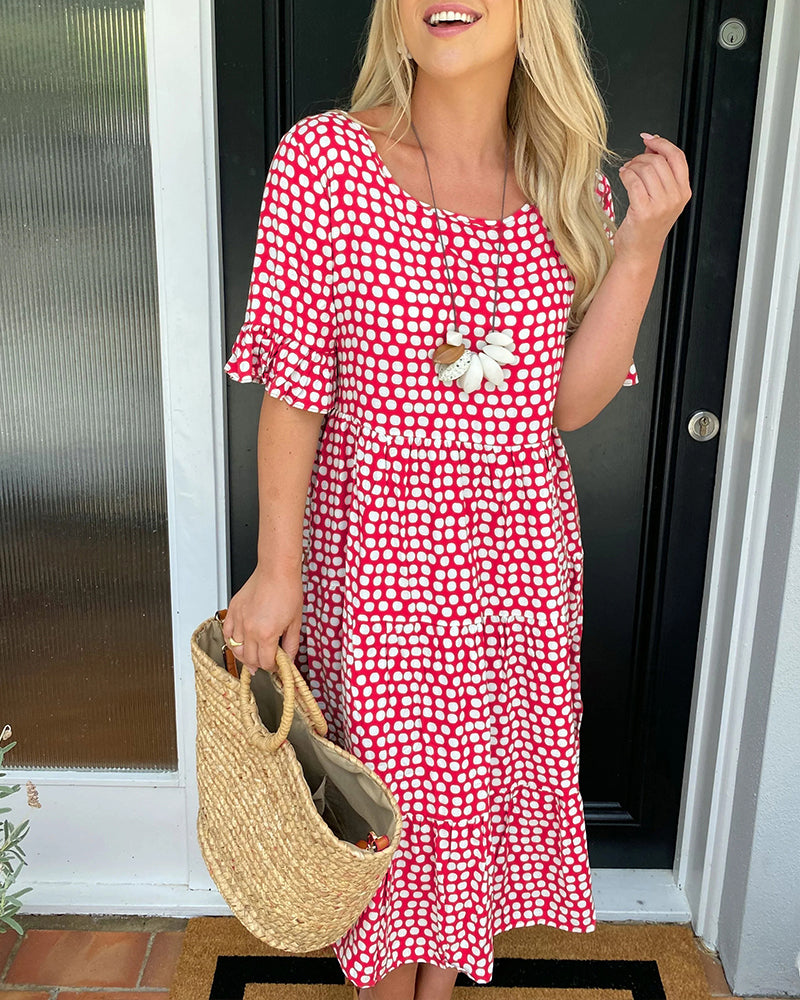 Polka Dot Midi Dress with a Round Neckline