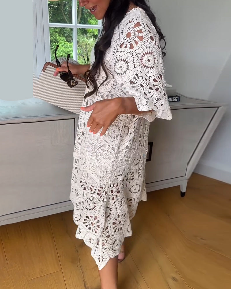 Cotton Dress Featuring a Cut-Out Design and Half Sleeves