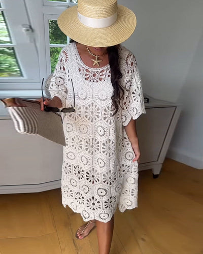 Cotton Dress Featuring a Cut-Out Design and Half Sleeves